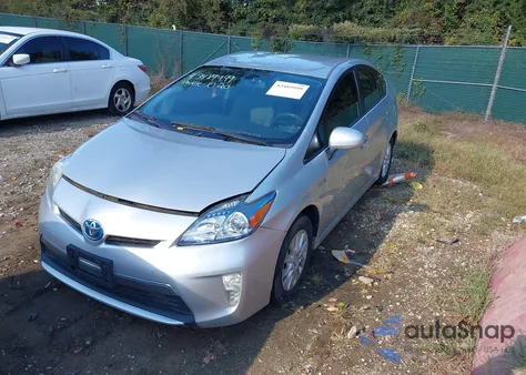 2014 Toyota Prius Plug-In z USA, uszkodzony, nr VIN JTDKN3DP6E3050779
